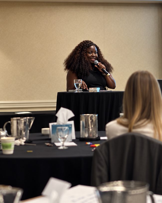 Motunrayo Babalola speaking to a conference audience