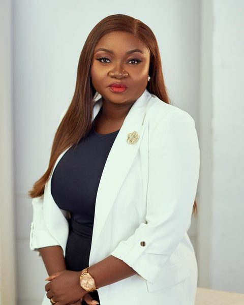 Portrait of Motunrayo Babalola in a white blazer